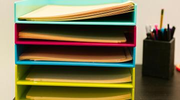 documents stored in a small desk unit